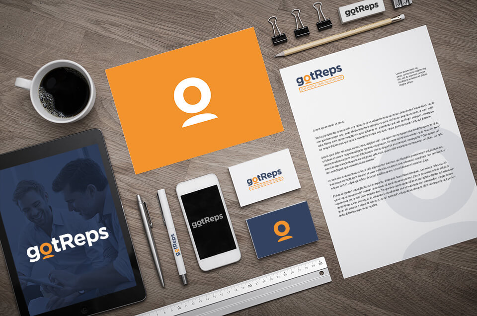 gotReps brand applications: orange folder, business cards, letterhead, branded pens and a phone and tablet mockup showing the logo